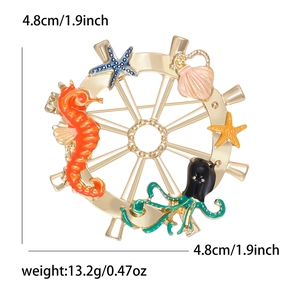 Marine nautical helm brooch with seahorse and octopus motifs, 4.8cm diameter, 13.2g weight