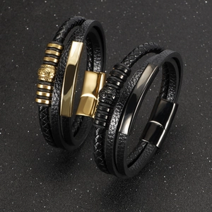 Men's multilayer black leather bracelet with gold and black metallic beads and magnetic clasp