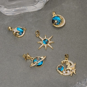 Starry sky gold pendants with blue zircon accents featuring moon sun and unicorn shapes