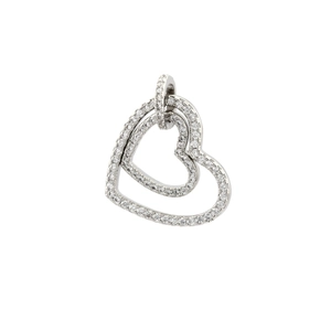 Macro shot of silver hollow heart pendant with micro-paved cubic zirconia accents