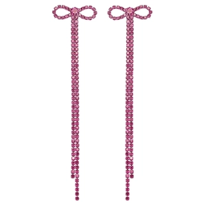 Detail showing elegant rose pink rhinestone bow earrings with long tassel fringes