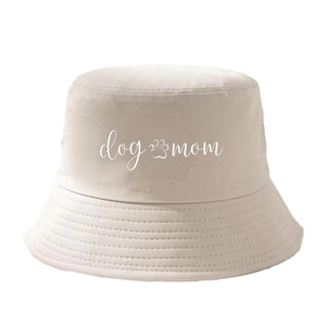 Classic beige dog mom cotton bucket hat with white text and paw print for sun protection
