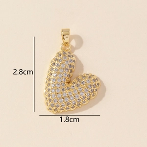 Golden heart pendant with sparkling cubic zirconia pavé and size 1.8cm x 2.8cm