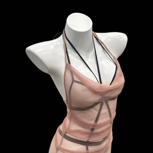 Pink glitter mesh halter dress with cowl neck and black straps on a mannequin