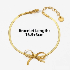 Vue détaillée du bracelet serpent en acier doré avec nœud et spécifications