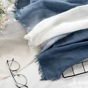 Breathable cotton linen scarf with blue and white gradient dye and fringe edges