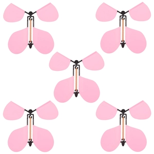 Set of five pink flying butterfly toys showing the rubber band power mechanism clearly