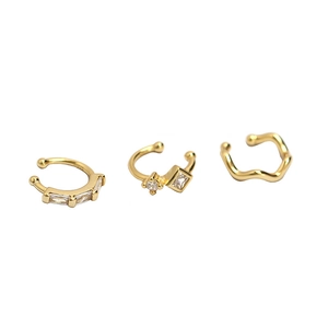 Set of 3 gold S925 silver ear cuffs featuring zircon stones and a wavy minimalist design