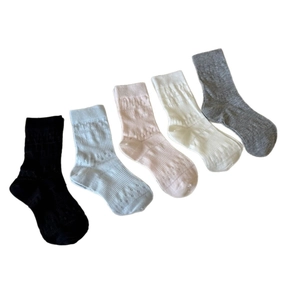 Breathable knit cotton mesh mid-calf socks for women in pastel colors with hollow patterns