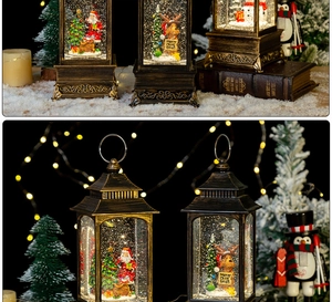 Détail de lanternes de Noël vintage en bronze avec effets de neige LED et figurines de fête