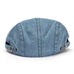 Rear view of vintage blue denim flat cap featuring adjustable copper side buckles
