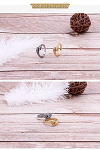 Detailed view of dual-headed snake rings with scaled texture in gold and silver finishes