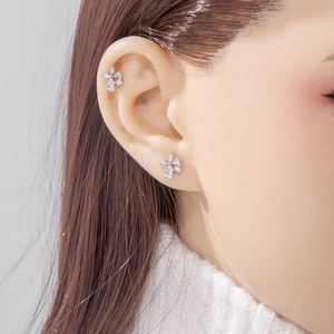 Exquisite silver bow-knot cartilage stud earrings with teardrop cubic zirconia insets