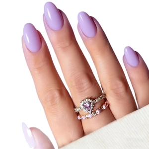 Elegant purple heart gemstone ring set with crown detailing and matching beaded band