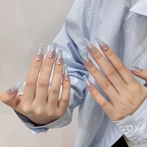 Elegant cat-eye gradient long coffin press-on nails with blue pink shades and rhinestones
