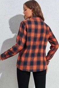 Back view of a long plaid flannel shirt showing a classic orange and navy checkered pattern