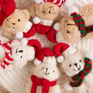 Christmas plush bears with knitted hats and scarves arranged in a festive circle