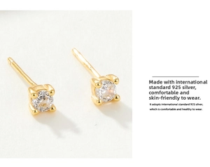 Close-up of four-prong round zircon stud earrings in 18K gold-plated S925 sterling silver