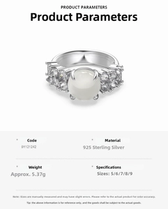 Detail view of S925 sterling silver ring with oval white gemstone and pave diamond accents