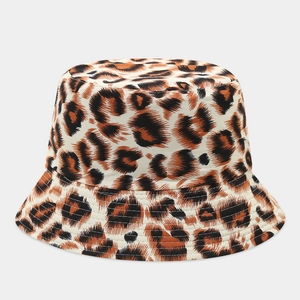 Close-up of leopard print bucket hat with high-quality stitching and canvas texture