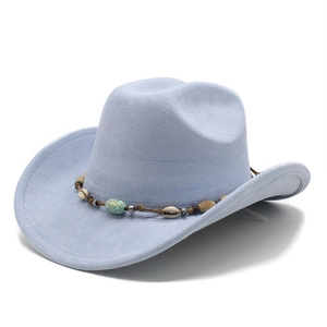 Detail of light blue suede cowboy hat with turquoise beads and shell ornament band
