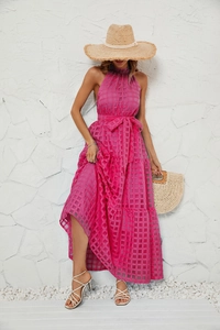 Detail of rose red plaid halter maxi dress with layered ruffle hem and matching fabric belt