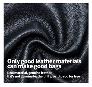 Close-up of black genuine leather texture with lychee grain pattern for elephant keychain