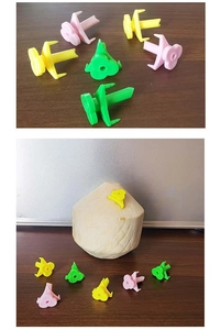 Portable plastic coconut opener tool for easy hole punching shown in multiple colors