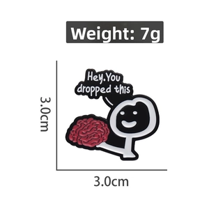 Cartoon enamel pin of a person holding a brain with size scale 3.0cm by 3.0cm