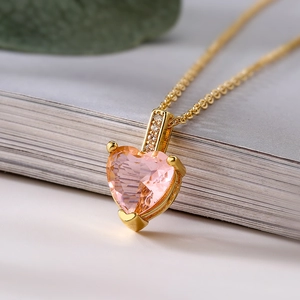 Elegant gold plated necklace with a large pink heart zircon pendant and fine link chain