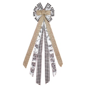 Large Christmas ribbon bow with buffalo plaid and silver deer patterns for tree topper