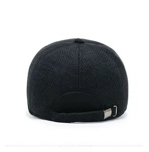 Close-up of winter wool baseball cap back view with herringbone pattern and metal buckle
