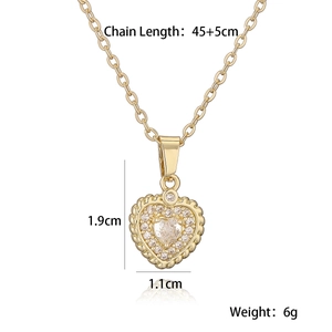 Detail view of gold heart necklace showing chain length 45+5cm and 1.9cm pendant size