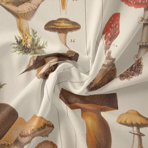 Detailed view of bohemian mushroom print fabric showing vintage patterns and soft texture
