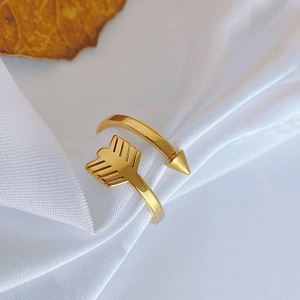 Minimalist 18k gold-plated titanium steel arrow open ring displayed on white silk