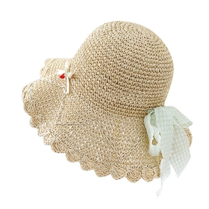 Handwoven straw sun hat with scalloped edges, cherry accents, and green gingham ribbon