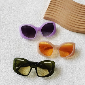 Elegant cat-eye sunglasses for women with butterfly frames in assorted matte colors