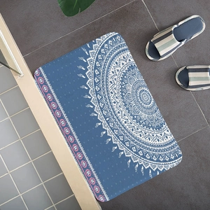 Detailed view of square flannel absorbent mat with blue mandala pattern and floral accents