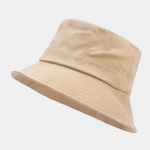 Detail of beige cotton bucket hat showing reinforced brim stitching and metal eyelet vent