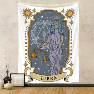 Detail of Libra zodiac tapestry featuring celestial goddess and golden scales on textured wall