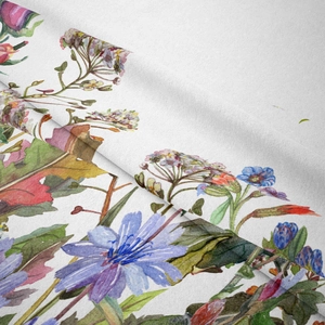 Close-up of bohemian watercolor floral tapestry showing fine woven texture and details