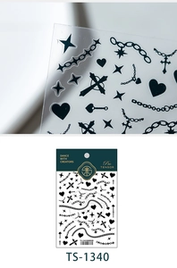 Macro view of mechanical punk nail stickers with black stars and cross designs