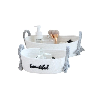 Two-piece white cotton rope storage baskets with grey handles and beautiful embroidery