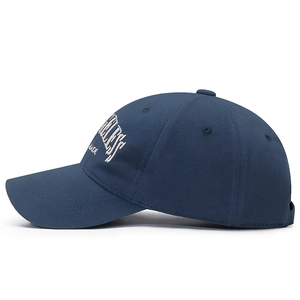 Classic navy blue cotton baseball cap with BELESS MADE embroidery on a clean white background