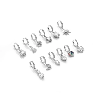 Collection of silver hoop earrings with butterfly, heart, and flower zircon pendants