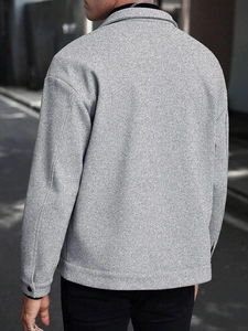 Rear view of men's casual grey wool jacket with textured fabric and buttoned cuffs detail