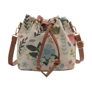 Ethnic style bucket bag for women with floral jacquard fabric and leather drawstring
