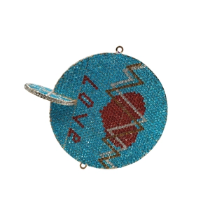 Macro detail of sky blue round martini cocktail clutch bag with crystal lettering
