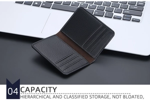 Detail of slim black lychee grain leather wallet with four brown card slots storage