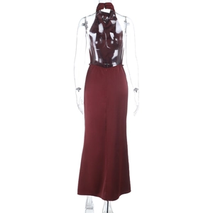 Detail showing the elegant backless design and halter neck of the burgundy satin dress